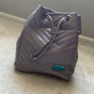 Brand new Bella Russo drawstring backpack purse.